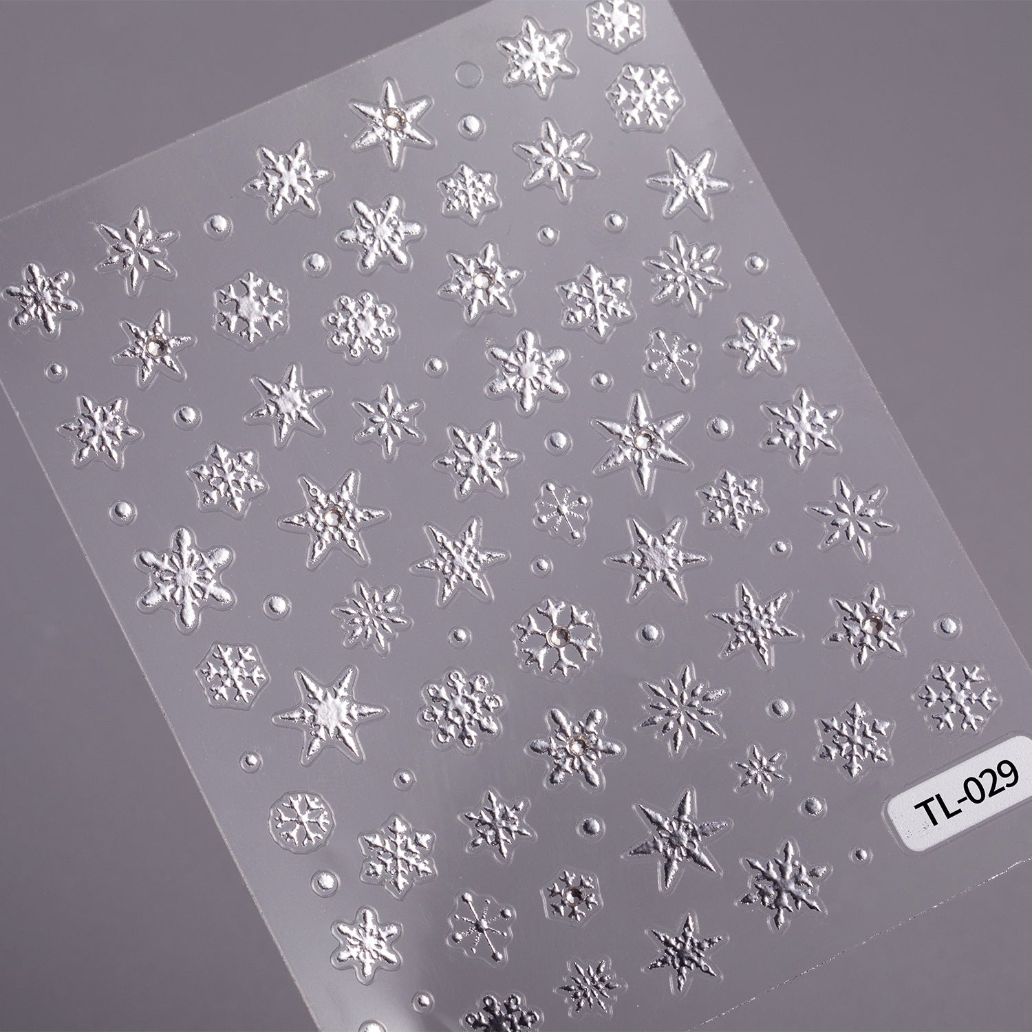 Silver Snowflake Nail Art